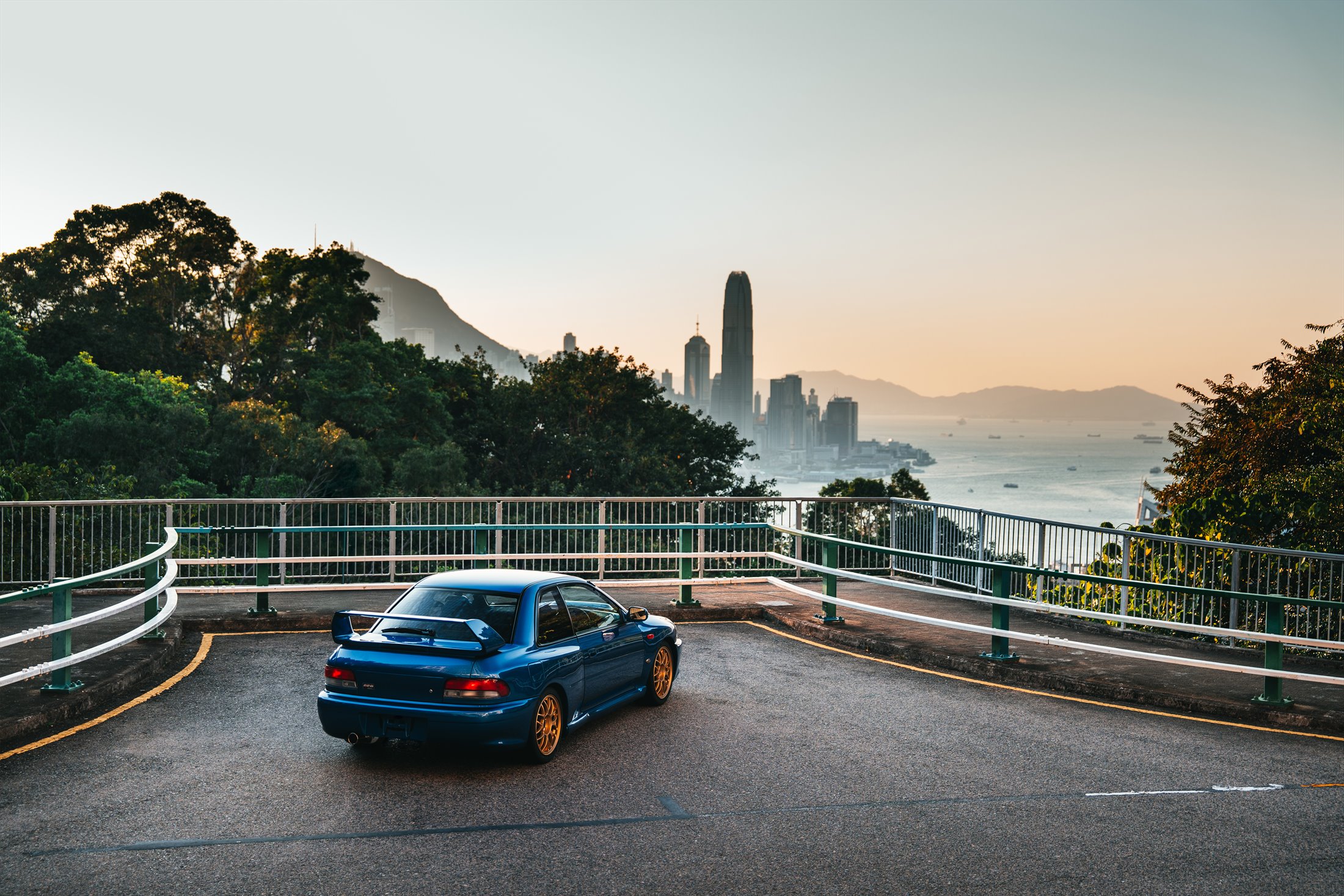 Subaru Impreza 22B STi overlooking Hong Kong at sunset
