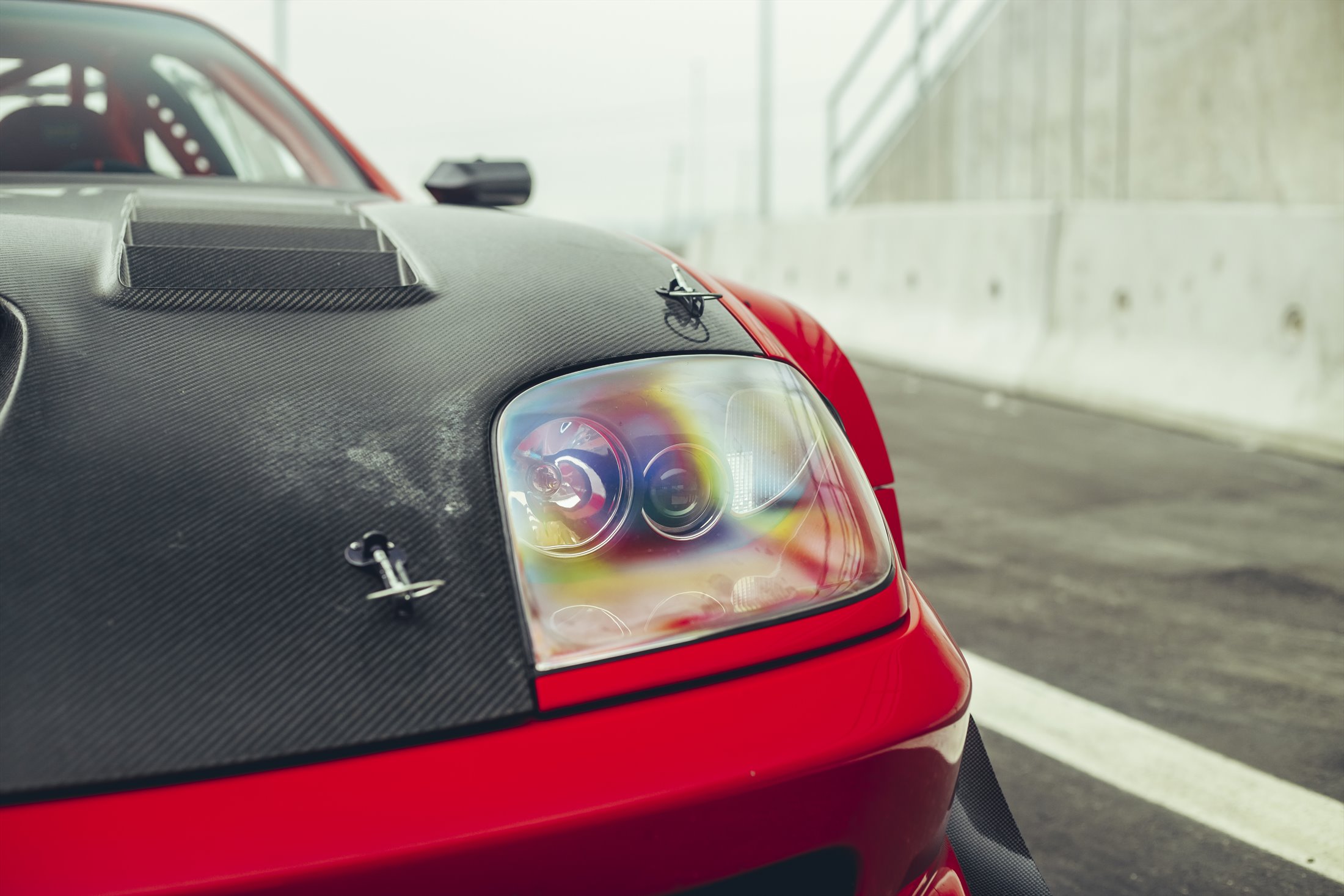 Ferrari 550 Maranello headlight and carbon-fibre bonnet