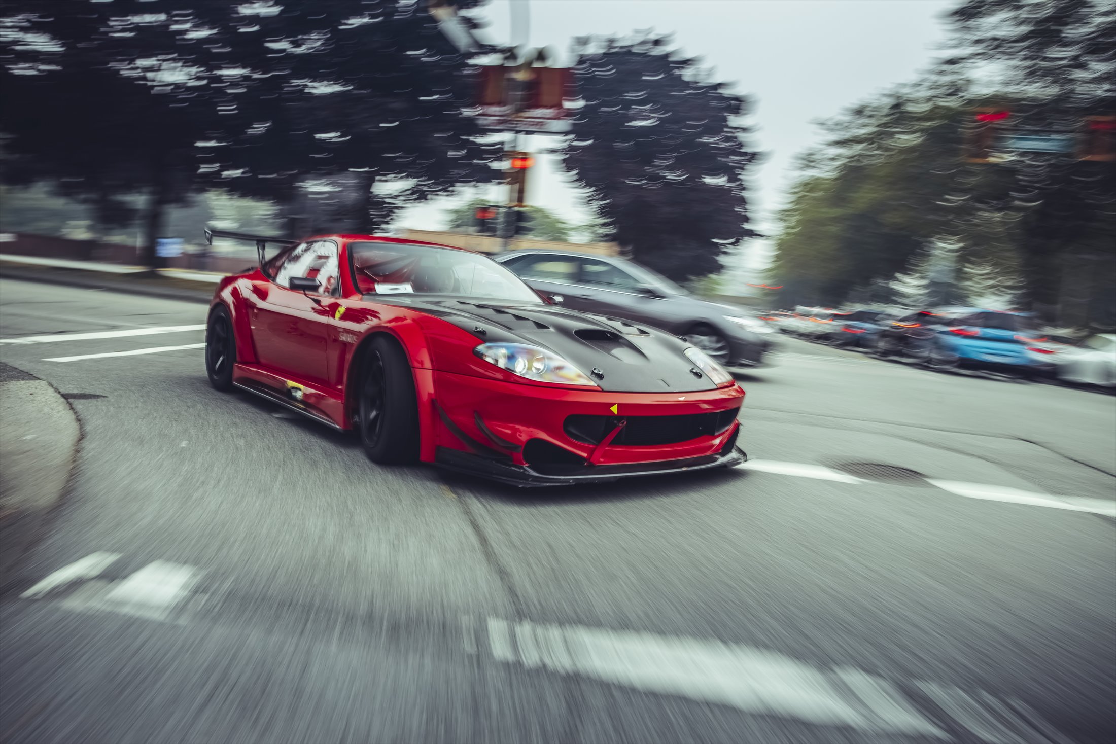 Garage Saurus Ferrari 550 Maranello driving through the city