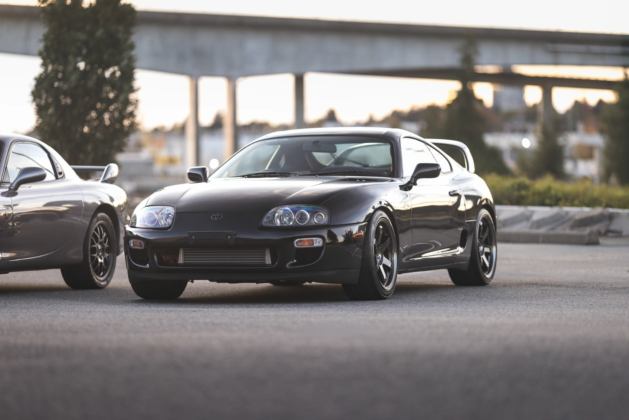 Black 1998 Toyota Supra RZ in front three-quarter view