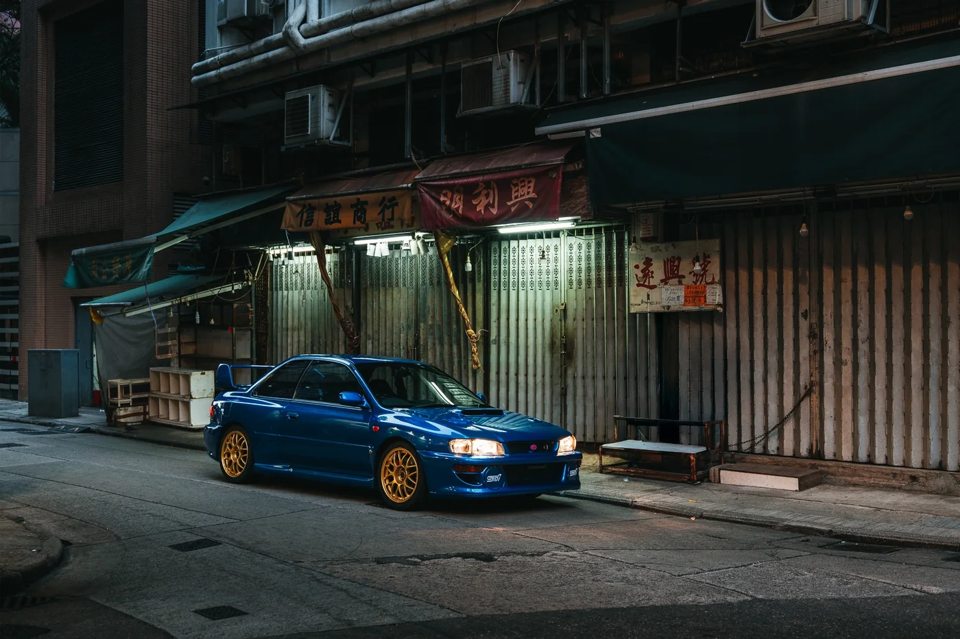 Blue Subaru Impreza 22B STi in a Hong Kong alley