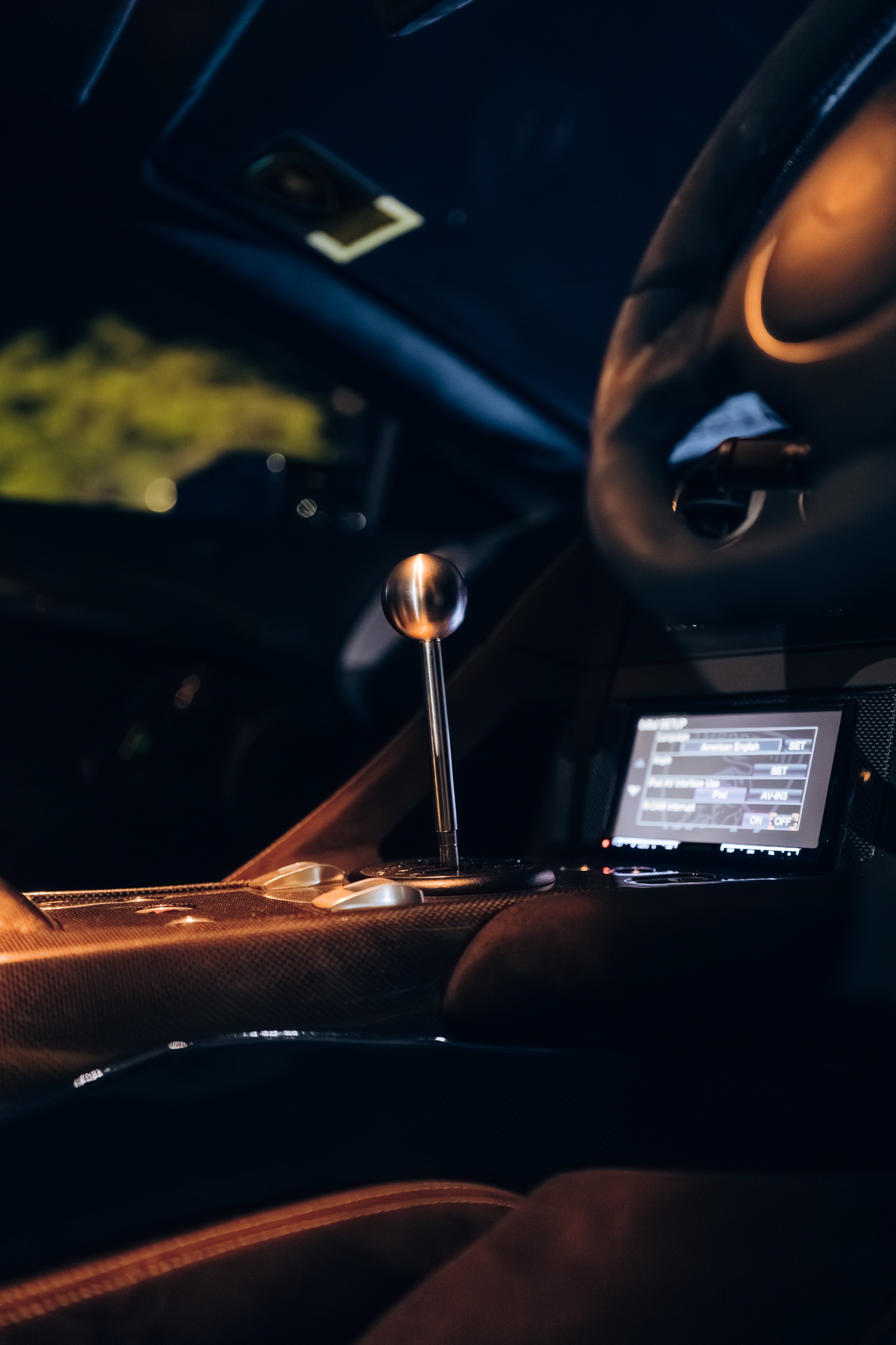 Exposed gated six-speed shifter in the right-hand-drive Murciélago SV