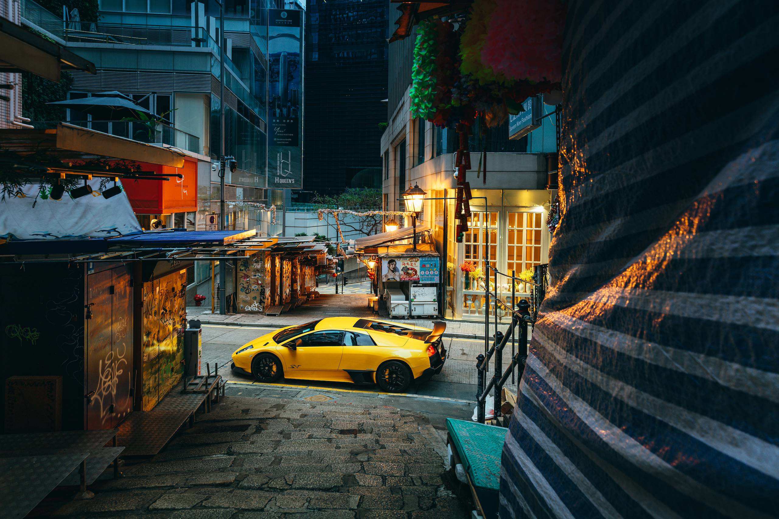 Murciélago SuperVeloce framed by a Hong Kong street