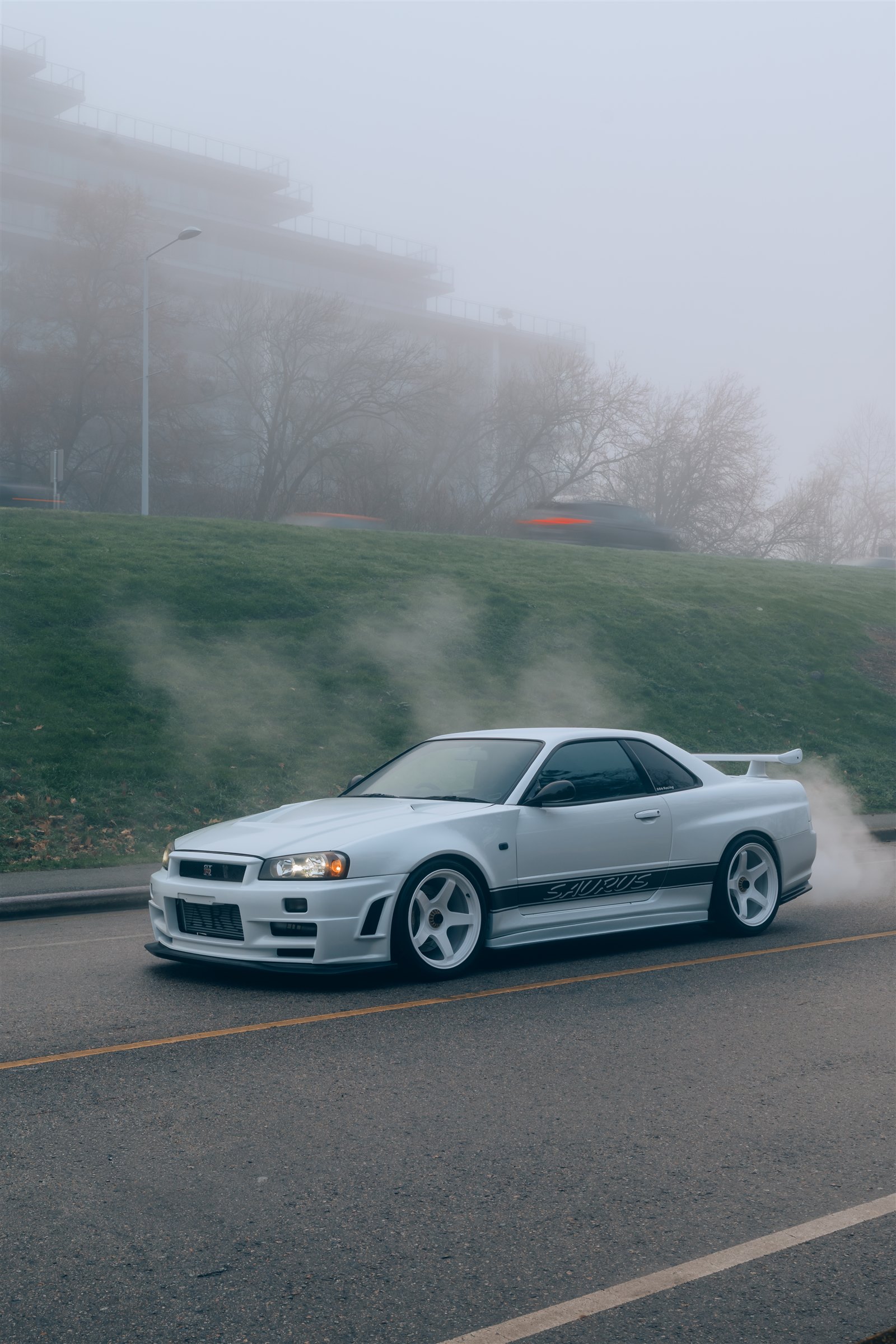 Garage Saurus R34 driving through the fog