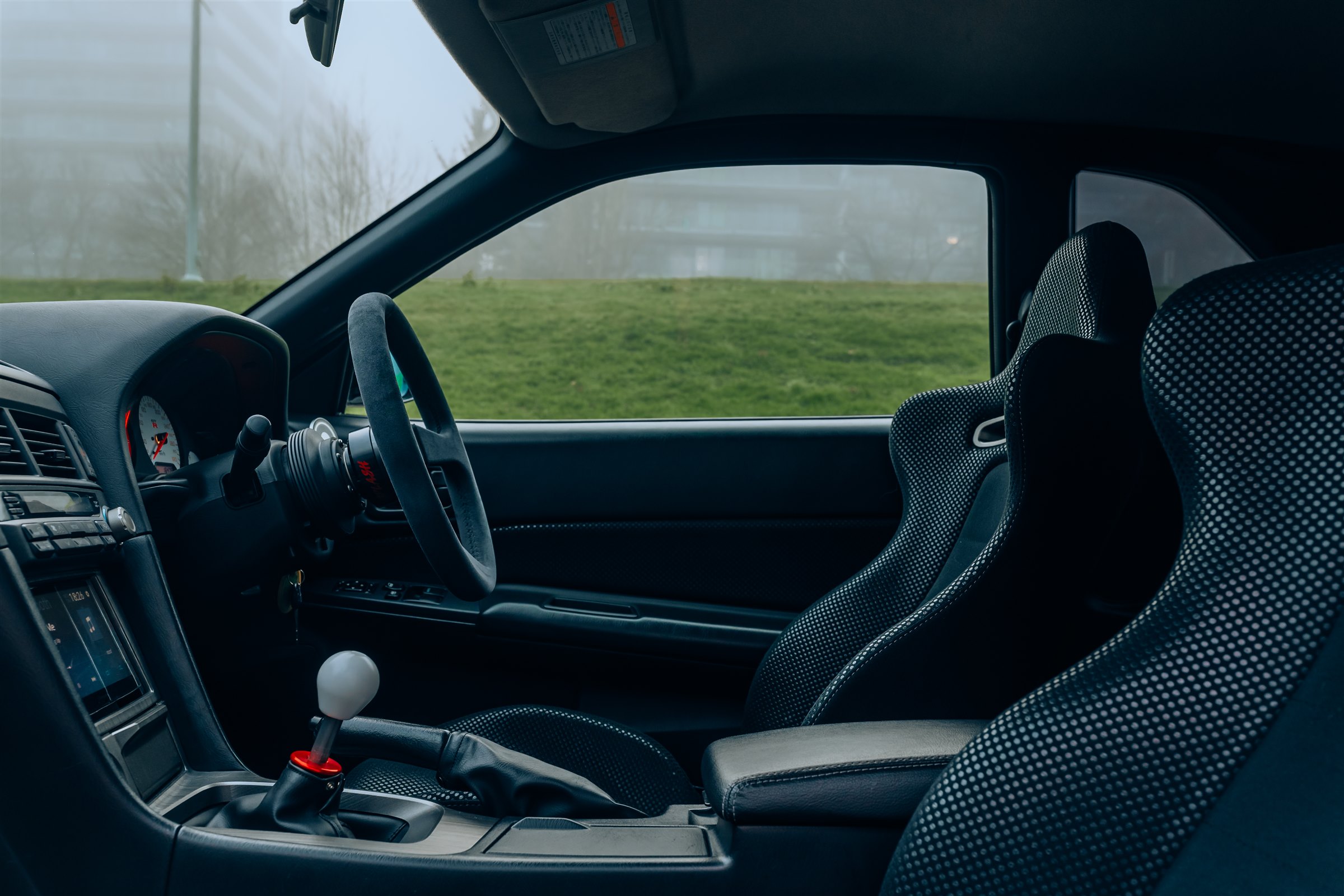 Kouki black interior of the Garage Saurus R34